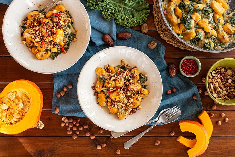 Pumpkin Gnocchi with kale, hazelnuts, and pink peppercorns